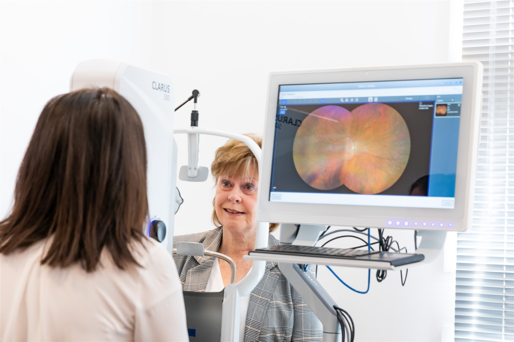 Patient receiving a specialist eye examination